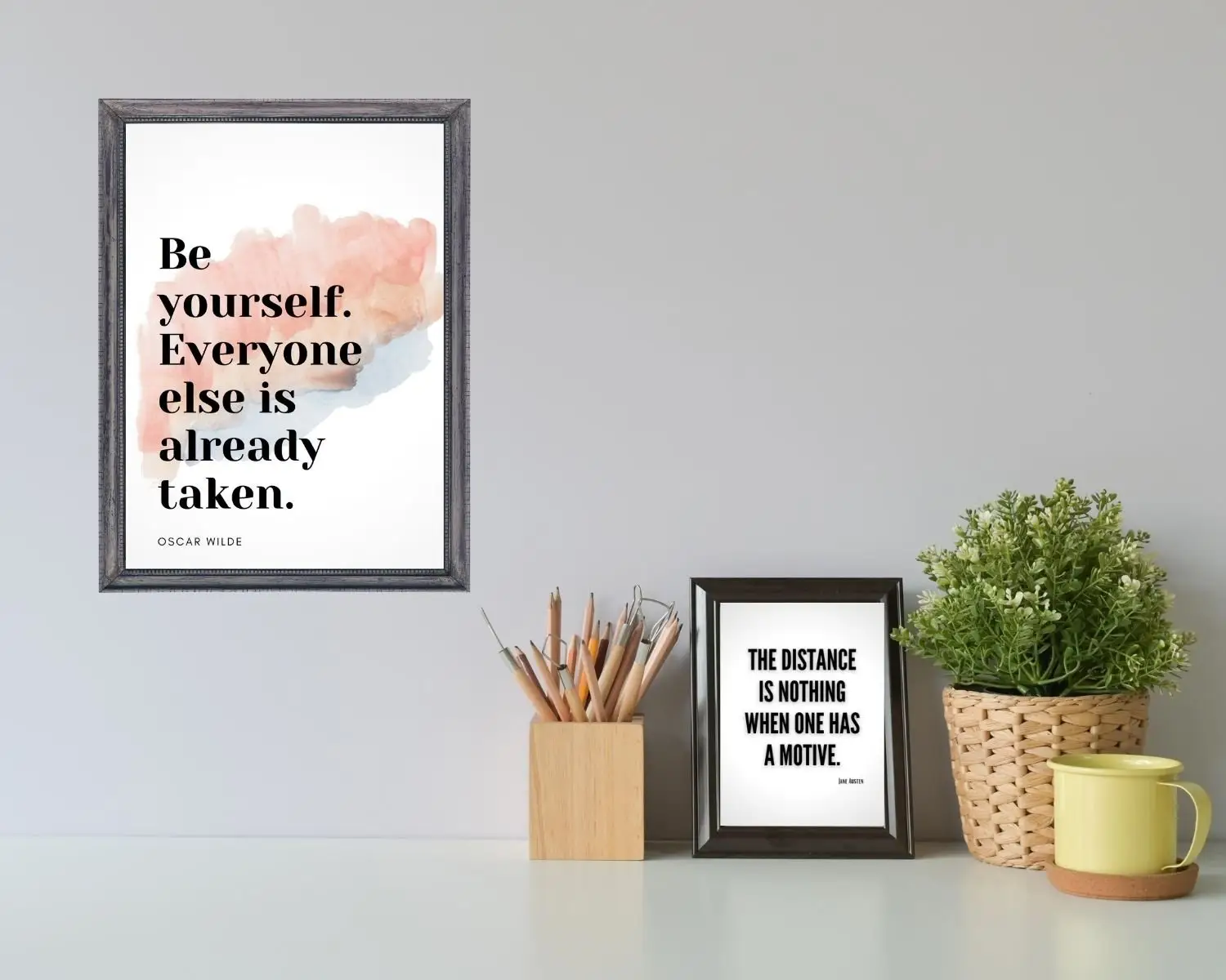 Inspirational Quote Art decorates a desk with a plant and mug